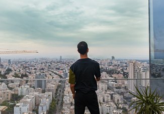 Man Overlooking Beautiful View | Blog | Greystar